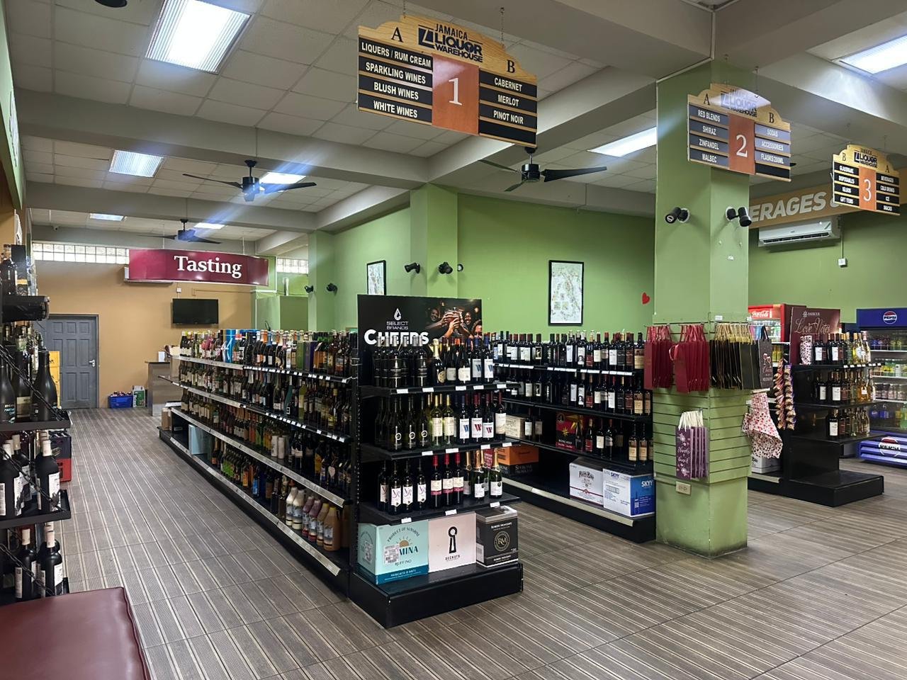 Inside Jamaica Liquor Warehouse: aisles of wine, rum and spirits
